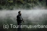 Angler mit Nebel